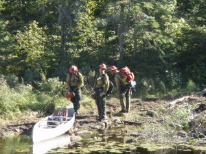 Pagami Creek firefighters by canoe