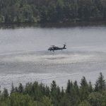 Blackhawk dipping water