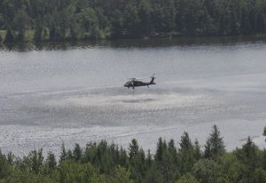 Blackhawk dipping water