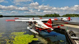 Three DeHavilland Beavers docked at the Ely Sea Plane Bae