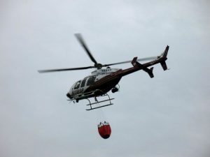 State Patrol helicopter with bucket
