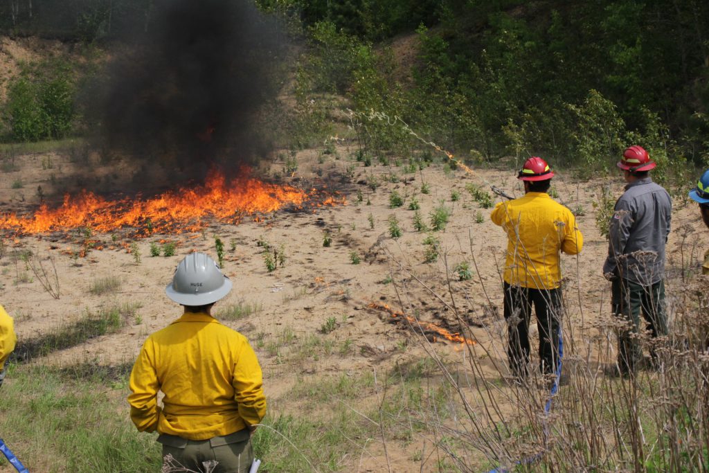Wildfire Academy student learning to use a Terra Torch